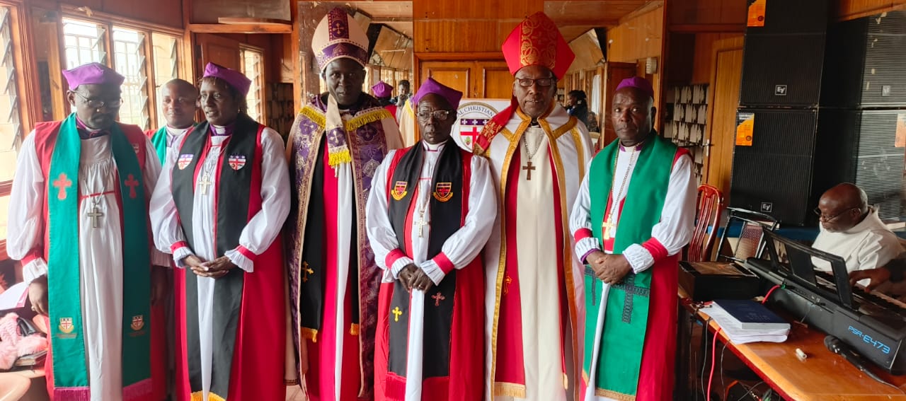 Bishops and clergy in vestments at a service